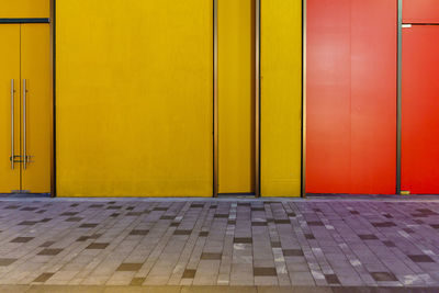 Closed door of yellow building