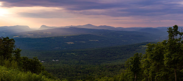 Scenic view of mountains against sky during sunset