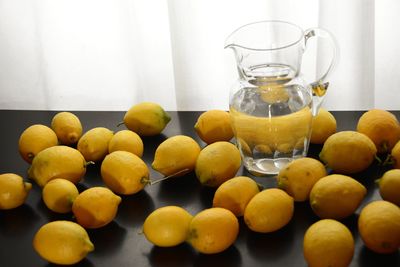 Close-up of fruits in glass on table