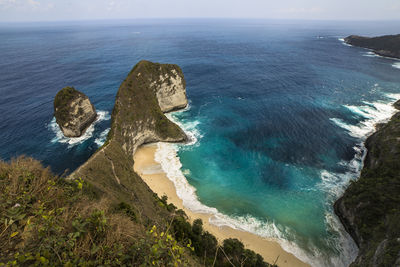 High angle view of rocks in sea, nusa penida, indonesia 