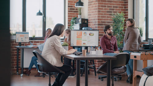 Business colleagues working at office