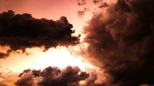 Low angle view of clouds in sky during sunset