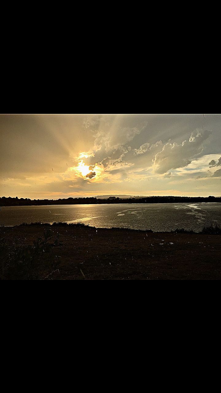 sunset, sea, water, sky, horizon over water, scenics, tranquil scene, beauty in nature, tranquility, cloud - sky, nature, beach, idyllic, shore, cloud, orange color, silhouette, outdoors, sun, no people