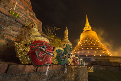 Sculpture of temple outside building