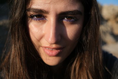 Close-up portrait of young woman