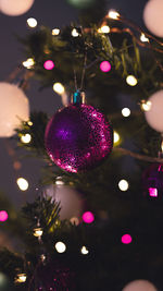 Close-up of illuminated christmas tree