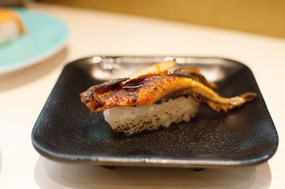 High angle view of meat in plate on table