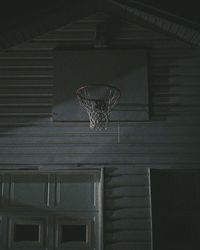 Low angle view of basketball hoop on house