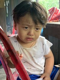 High angle view of young woman sitting at home