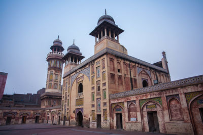 Low angle view of historic building against clear sky