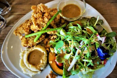 High angle view of breakfast served on table
almond crusted fish with miso sauce