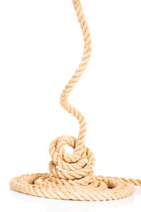 Close-up of rope on white background