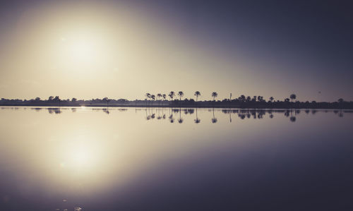 Scenic view of sunset over river