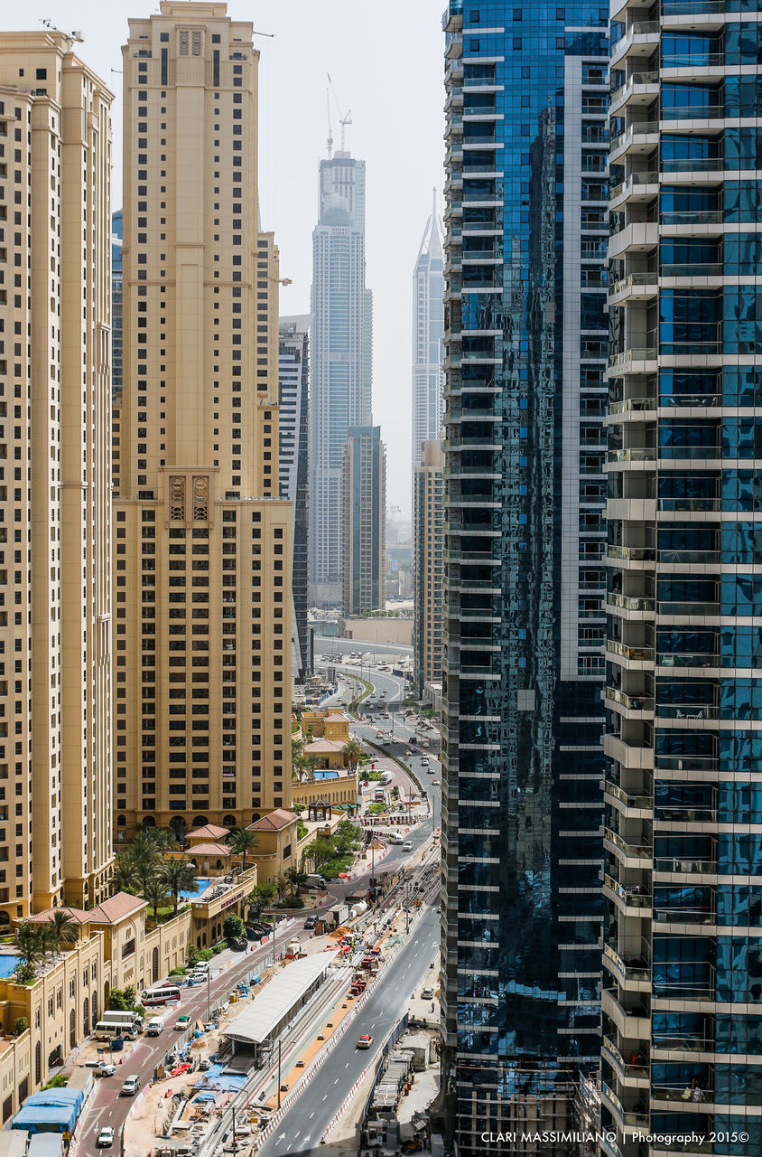 MODERN BUILDINGS IN CITY AGAINST SKY