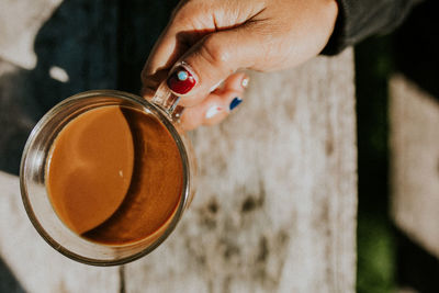 Close-up of hand holding drink