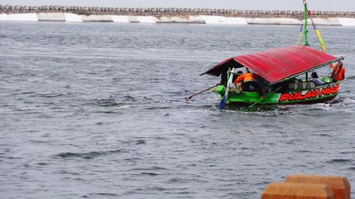 Boat sailing in sea