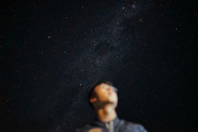 Low angle view of stars against sky at night