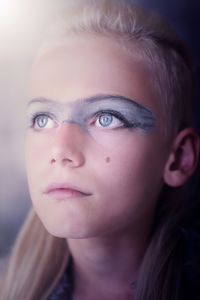 Close-up of girl with eye make-up