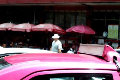 Rear view of man driving car