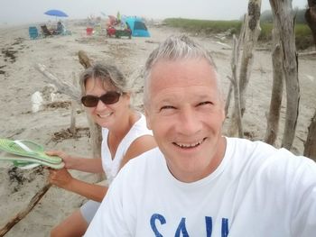 Portrait of smiling man on beach