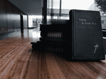 Close-up of open book on table at home