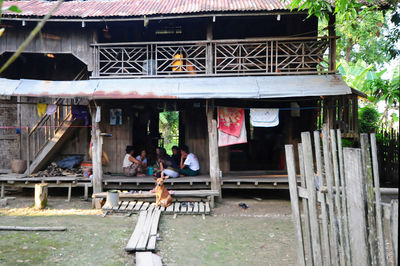 People sitting outside building