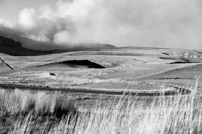 Scenic view of land against sky