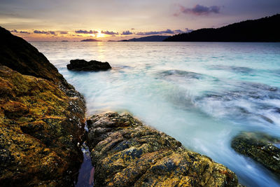 Scenic view of sea against sky during sunset