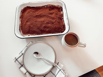 High angle view of coffee cup on table