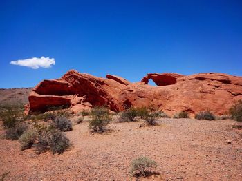 Rock formations in valley of fire state park against blue sky