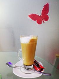 Close-up of coffee cup on table