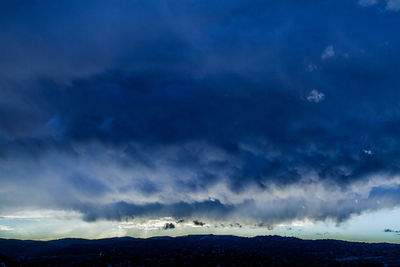 Scenic view of landscape against blue sky