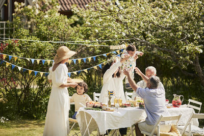 Family having party in garden