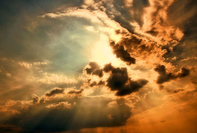 Low angle view of clouds in sky during sunset