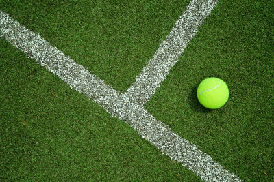 High angle view of tennis ball on field in court