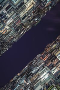 High angle view of cityscape against sky at night
