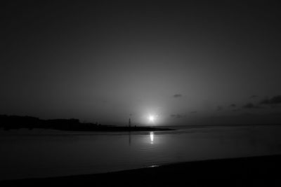 Scenic view of sea against sky at sunset