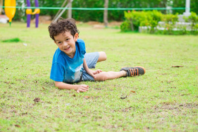 Cute boy on field