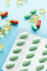 Close-up of pills on white background