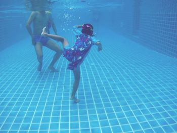 People swimming in pool