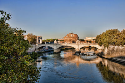 Bridge over river against sky