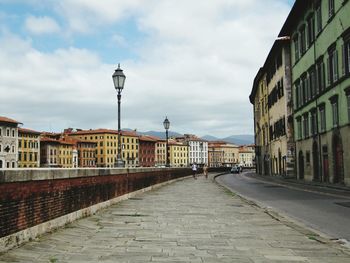 View of buildings in city against sky