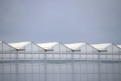 Greenhouse against clear sky