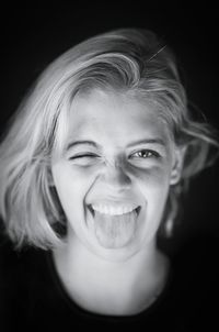 Close-up portrait of a smiling young woman