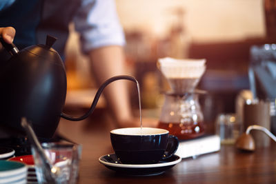 Close-up of coffee cup on table