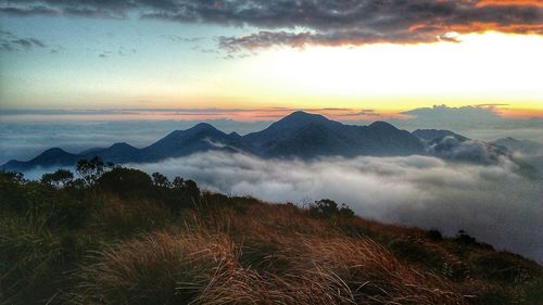 Scenic view of dramatic sky during sunset