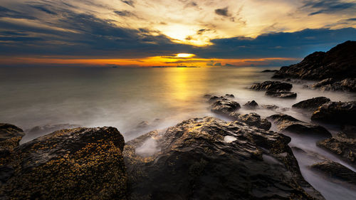 Scenic view of sea against sky during sunset