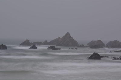 Scenic view of sea against clear sky