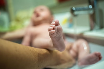 Cropped image of man holding hands