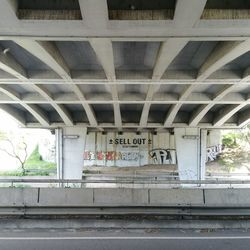 Graffiti on bridge in city